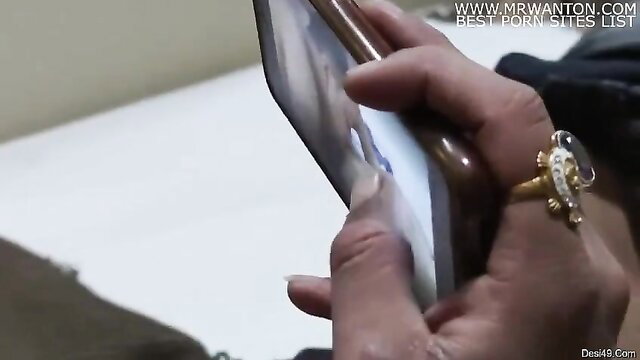 Asian bhabi hands gripping phone in naughty closeup preview