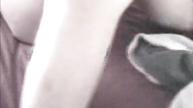 Blurry closeup of woman in lingerie with man groping her tits