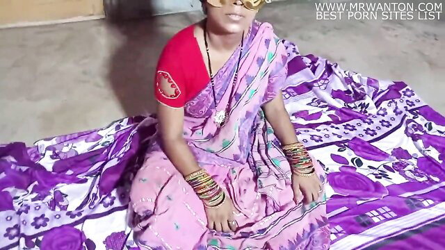 Indian MILF in pink saree sits seductively, mother-in-law tease