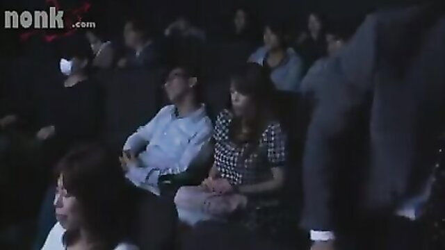 Japanese MILF in polka dot dress groped by stranger in dark cinema