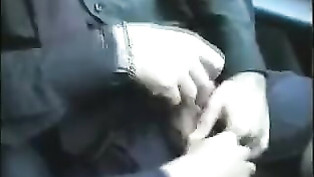 Man in dark jacket handling hands in car, amateur hooker hire near Lisbon