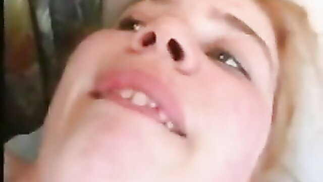 Closeup of cute blonde teen girl's smiling face in amateur anal video