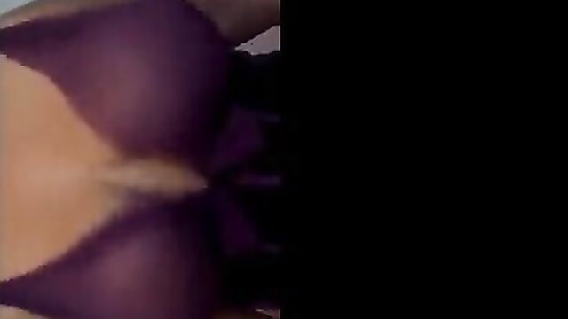 Tiffany Cappotelli busty cleavage in purple lingerie closeup