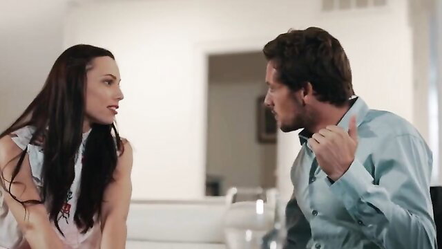 Brunette woman in tank top argues intensely with handsome man in shirt