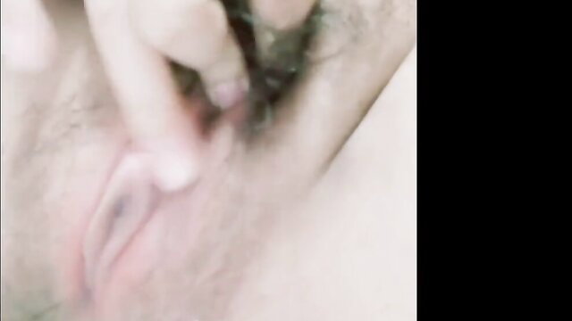Closeup of hairy pussy with big clit fingered, amateur solo tease