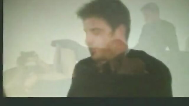 Devon and Julian in steamy gay embrace, naked and intense