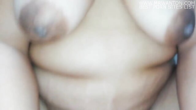 Close-up of a woman's vulva being spread open