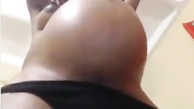 Hot pregnant ebony woman showing off huge round belly in POV