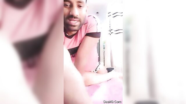 Desi Indian guy closeup selfie in pink shirt, amateur GF BF thumbnail