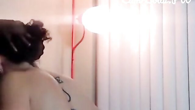 Sara Jay topless with curvy back and tattoo in webcam show