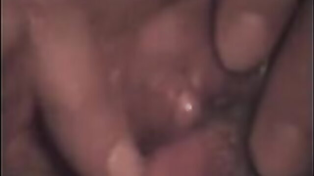 Closeup of wife's wet pink pussy with fingers spreading labia