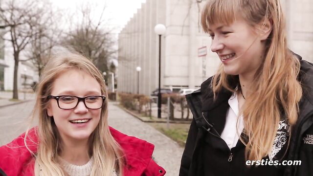 Ida & Holly smiling outdoors in coats at library, Ersties amateur