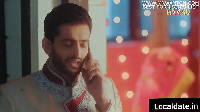 Handsome Indian man in sherwani on phone, unsatisfied bhabhi suhagrat scene