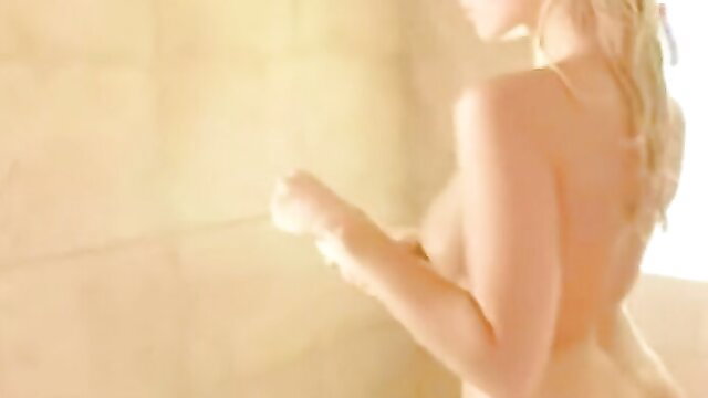 Blonde babe in steamy shower, nude back view with wet skin