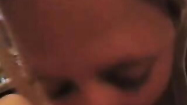 Closeup of woman's aroused face during warm cumshot