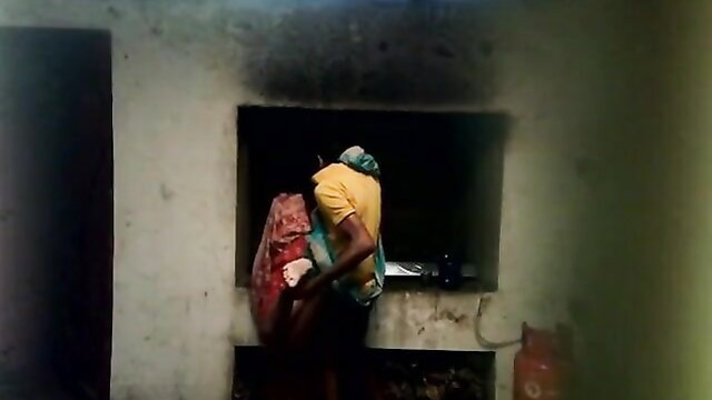Indian bhabi in kitchen bending over in red saree, amateur desi tease