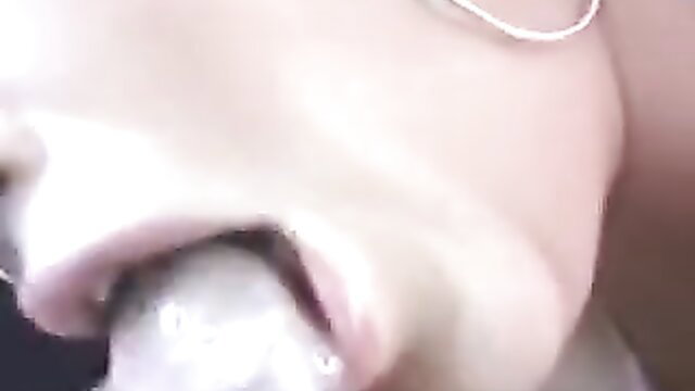 Hot blonde with tongue out in closeup oral tease