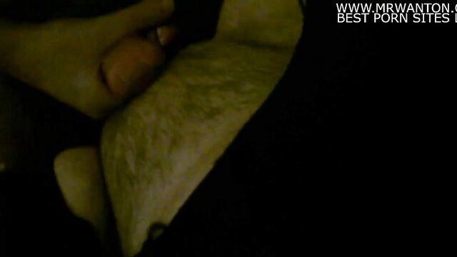 Close-up of a person's hand interacting with a male genital area