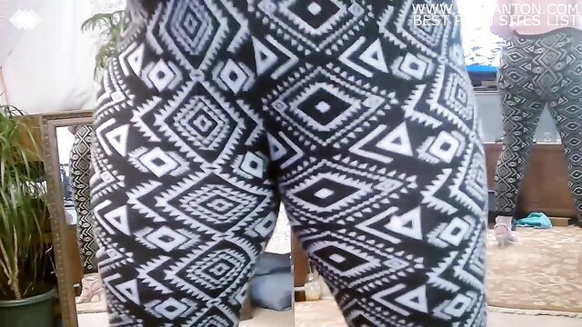 Big black ass bouncing in tight patterned leggings, thick thighs tease