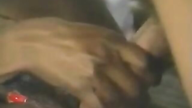 Peter North's hand stroking cock with cum flow in Black Ayes spunk scene