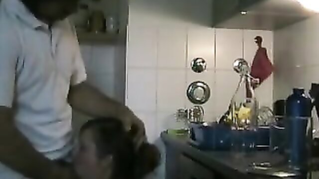 Hot amateur couple kitchen sex, man gripping woman's head