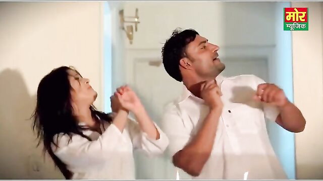 Haryanavi Indian couple passionately embracing in white outfits