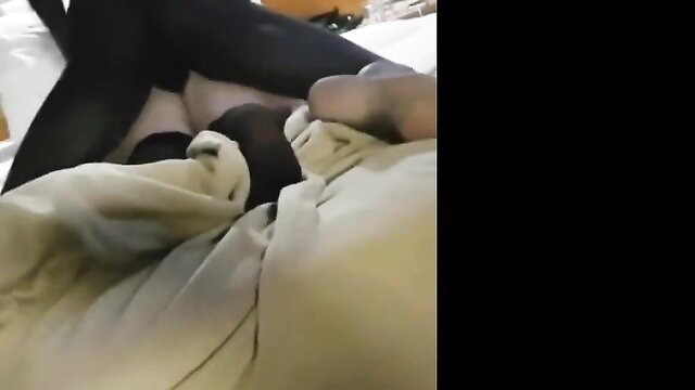 Slutwife in black stockings fucked by huge cock on bed closeup