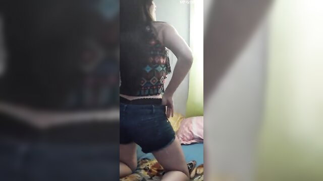 LucyHotGo teases in denim shorts and crop top, masturbating for fans