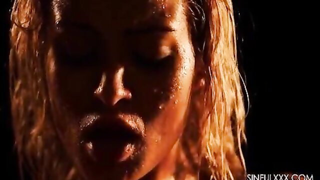 Sweaty black babe with wet blonde hair in intense closeup moan