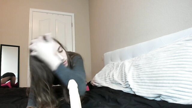 Braces teen with long hair sucks and rides huge dildo on bed