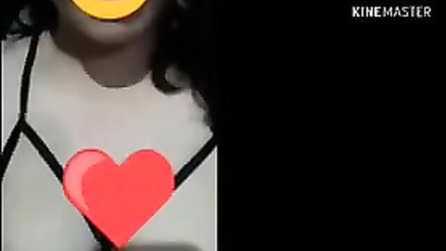 Egyptian black woman in black lingerie harness with red heart overlay