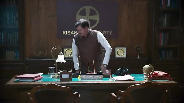 Indian politician Kamalika Chanda in sexy vest at desk