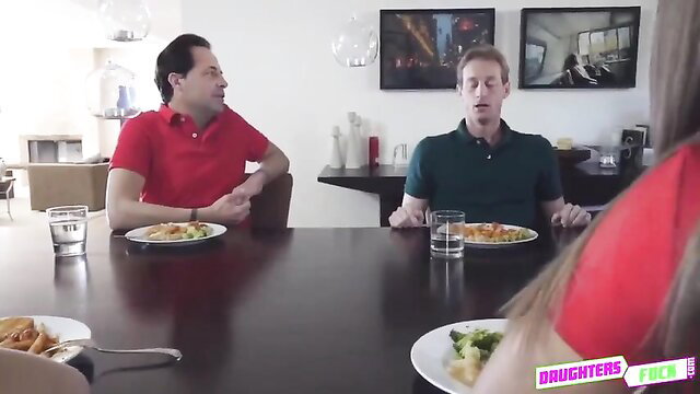 Liza Rowe joins two men at dinner table in sexy red top