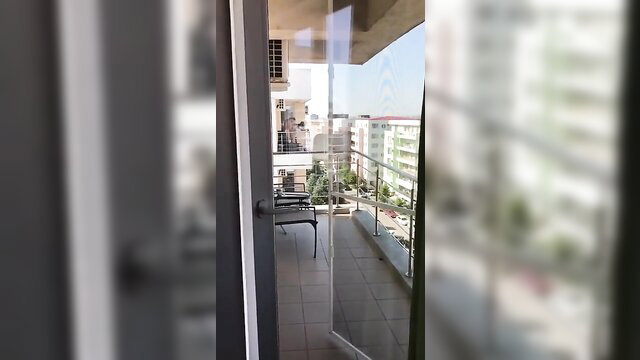 Blurry balcony view from Caught in Public by Kink studio