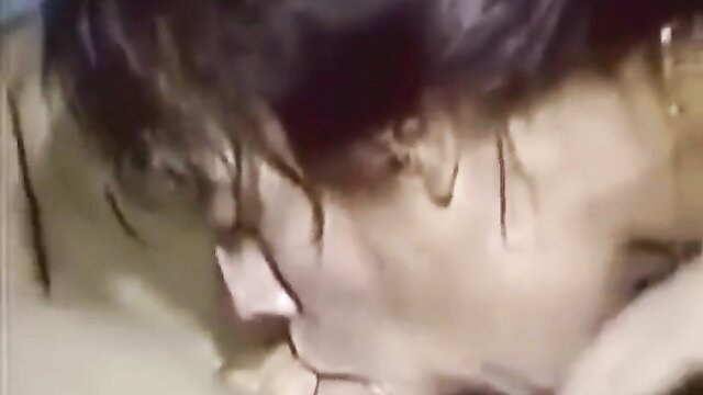 MILF deepthroats cock closeup, wet hair, intense blowjob action