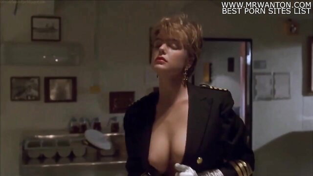 Erika Eleniak topless in sexy naval uniform, big tits exposed