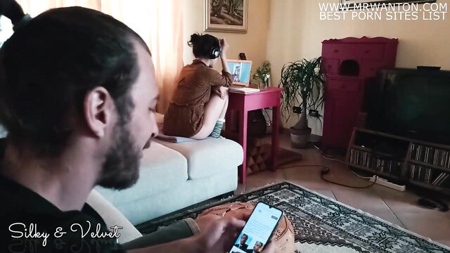 Man watches ponytail brunette in brown top on laptop sex toy call