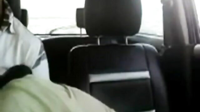 Amateur Asian woman fingered in car backseat by hand