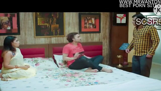 Hot Desi wife in yellow saree with jija and hubby on bed