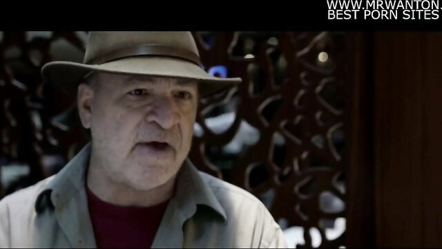 Older man in hat from Pornocratie doc on sex industry, serious gaze
