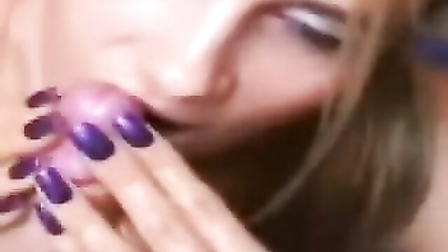 Closeup of hot babe's purple nails teasing pink cock lips in perfect handjob