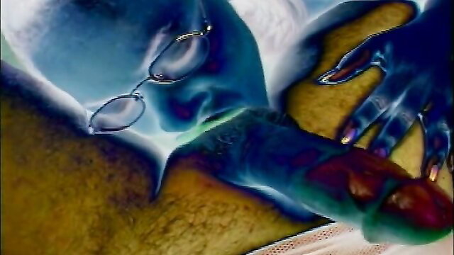 Blue-tinted closeup of woman fellating cock in surreal style