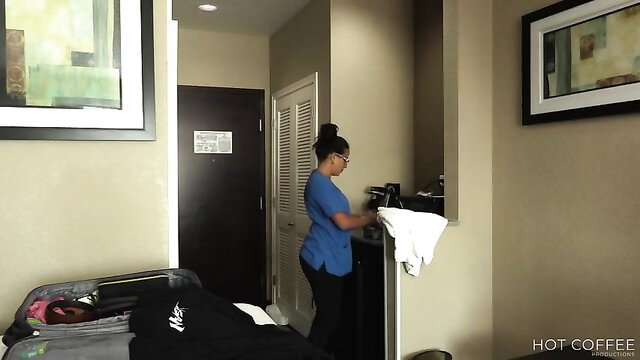 Hot Black Latina maid in tight scrubs bending over in hotel room