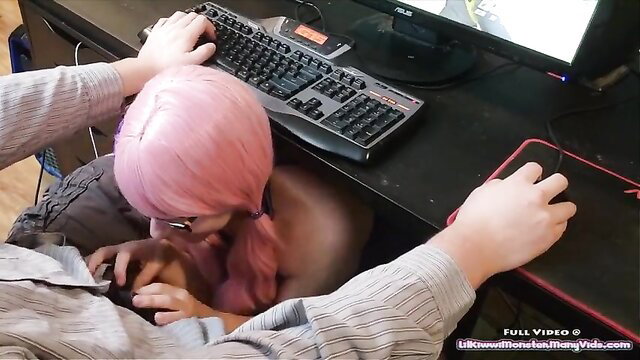 Pink-haired girl sneaks under stepbro's desk for sneaky blowjob during gaming