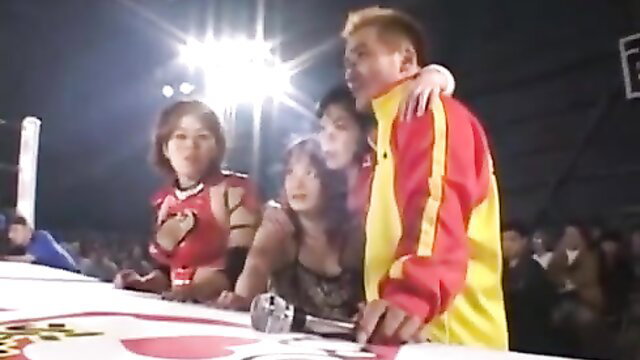 Sex wrestling defiance cup: Japanese women in sexy outfits with male wrestler on stage