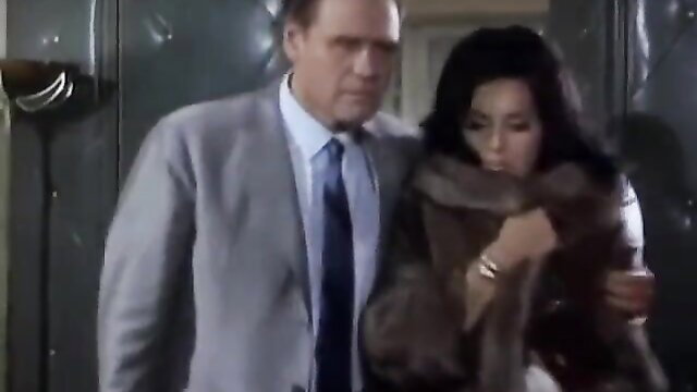 Isabel Sarli in Fuego vintage embrace with man in fur coat