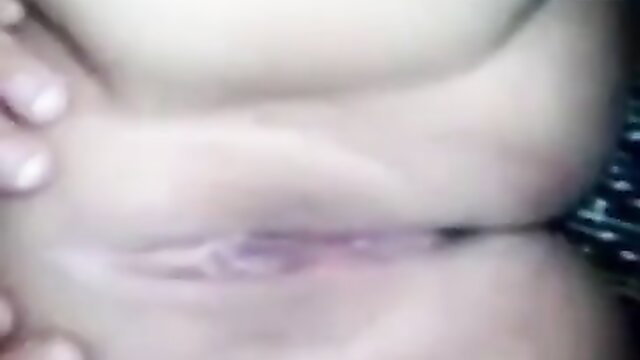 Arab Moroccan woman spreading shaved pussy lips closeup