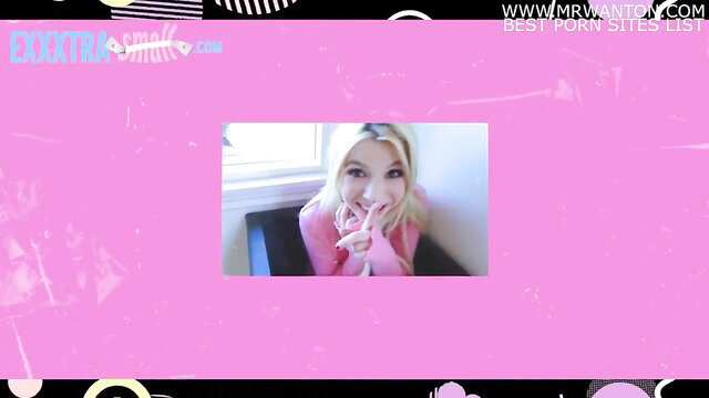 Blonde Carmela Clutch smiles playfully in pink sweater on AnalMom