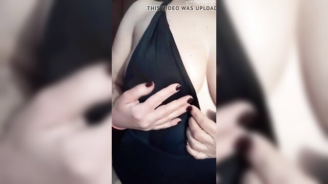 Big boobs oiled up in black dress, hands squeezing cleavage massage tease