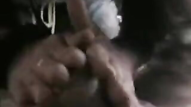 Rich Sri Lankan lady's hand stroking cock with white beads